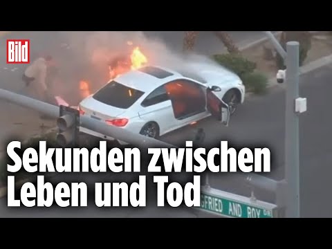 BMW explodiert nach Unfall: Polizei-Rettung in letzter Sekunde