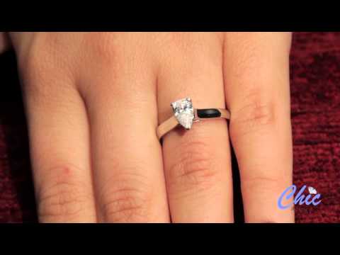 Solitaire engagement ring set with pear shape cubic zirconia in Platinum -item #P8112