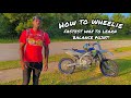 HOW TO WHEELIE A DIRT BIKE TUTORIAL FASTEST WAY TO LEARN BALANCE POINT YZ450F KO9ETV