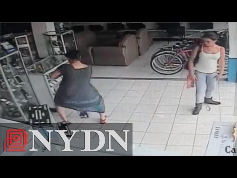 Raw: Woman in Costa Rica steals TV by hiding it under dress