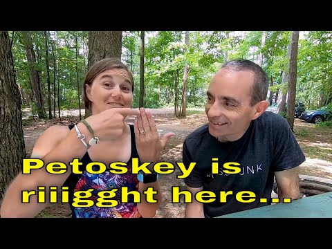 How do I reserve a campsite at Michigan state parks?