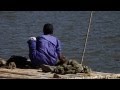 Woman Hand Washing Clothes In Kerala India Stock Video