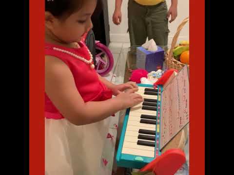 Atifa playing piano.... it was her birthday gift