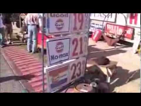 A bunch of old service station signs