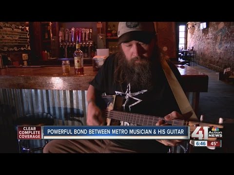 Powerful bond between a Kansas City musician and his cigar box guitar