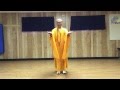 Master So demonstrates Qigong Tai Chi wearing his Buddhist robe