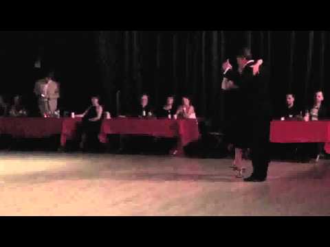  Marek Szotkowski  and  Monica Paz  are  dancing  to  "  Verdemar  "  by  Carlos di Sarli