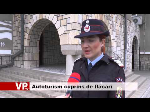 Autoturism cuprins de flăcări