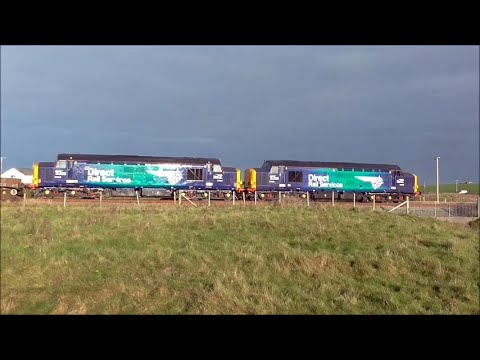 DRS Class 37s 37059+37609 at Valley, Anglesey on 6K41 nuclear flasks to Crewe, 04-12-2014.