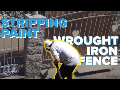 Dustless blasting a wrought iron fence to strip paint