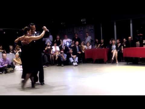  Ezequiel Paludi  and  Geraldine Rojas  are  dancing  to  the  vals  "  Lejos de ti  "  by  Rodolfo Biagi  at  Antwerpen Tango Festival  in  2015