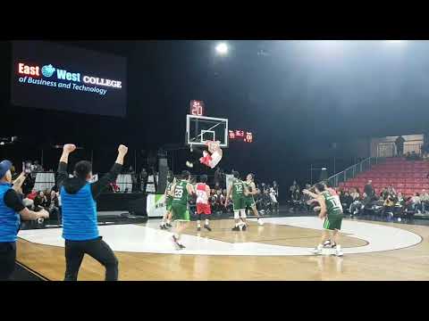 Northwestern Edmonton Basketball Club player shows off his hops almost jams against 4 defenders