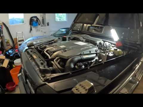 Replacing a coolant fitting on the back of the AMG G63 motor. M157 5.5L Twin Turbo Engine