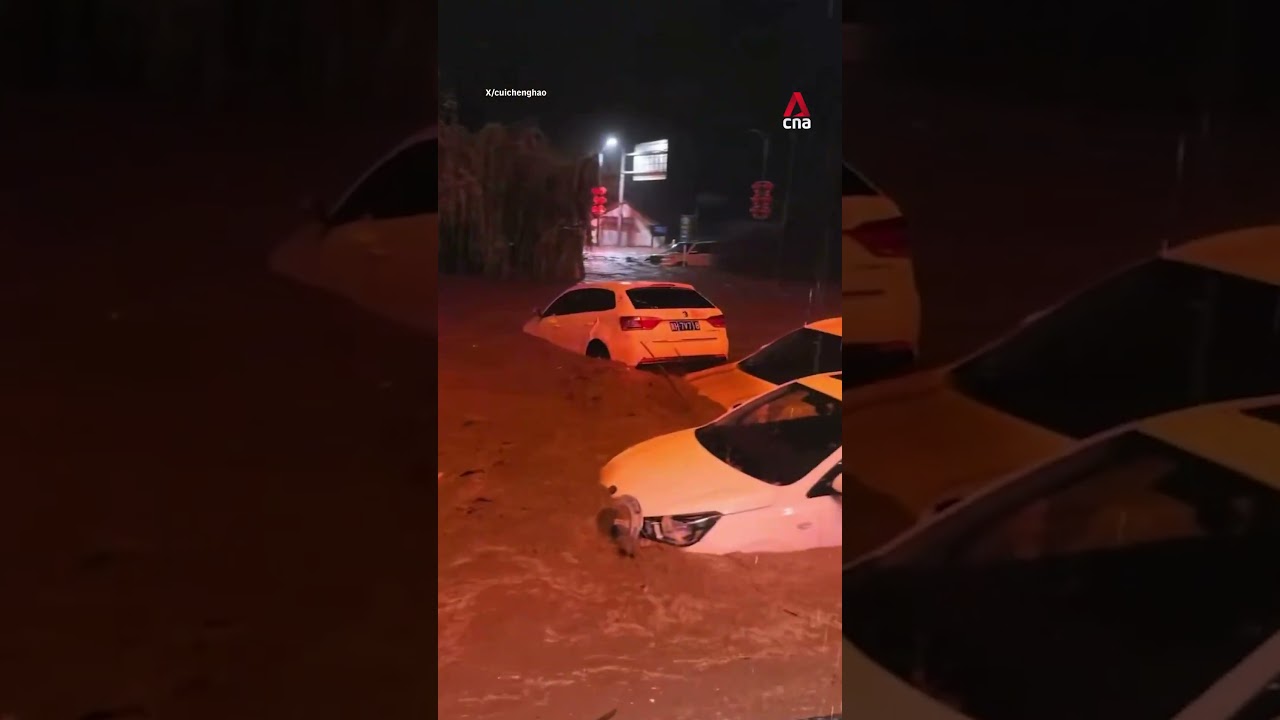 Typhoon Bavi floodwaters sweep vehicles away in Hebei province, China