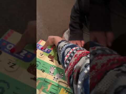 Qenxi doing alphabet puzzle part 2