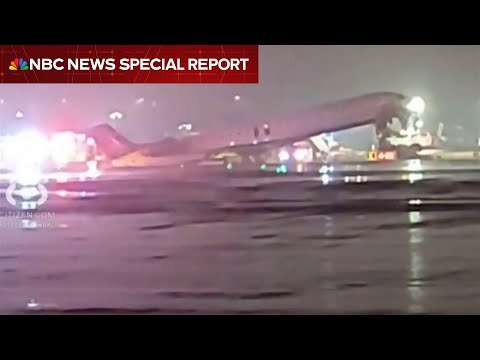 At least four injured in collision between plane and vehicle at NYC LaGuardia Airport