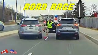 GROWN MAN TRIES TO KICK ANOTHER CAR IN ROAD RAGE