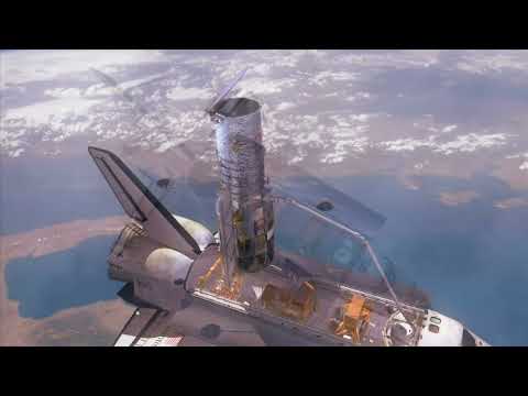 Hubble Space Telescope being Deployed from The Space Shuttle using a Robotic Arm