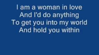 YouTube - Barbra Streisand - Woman in Love + Lyrics.flv