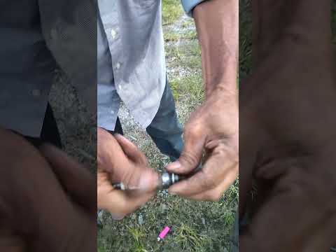 Car spark plug for brush cutter