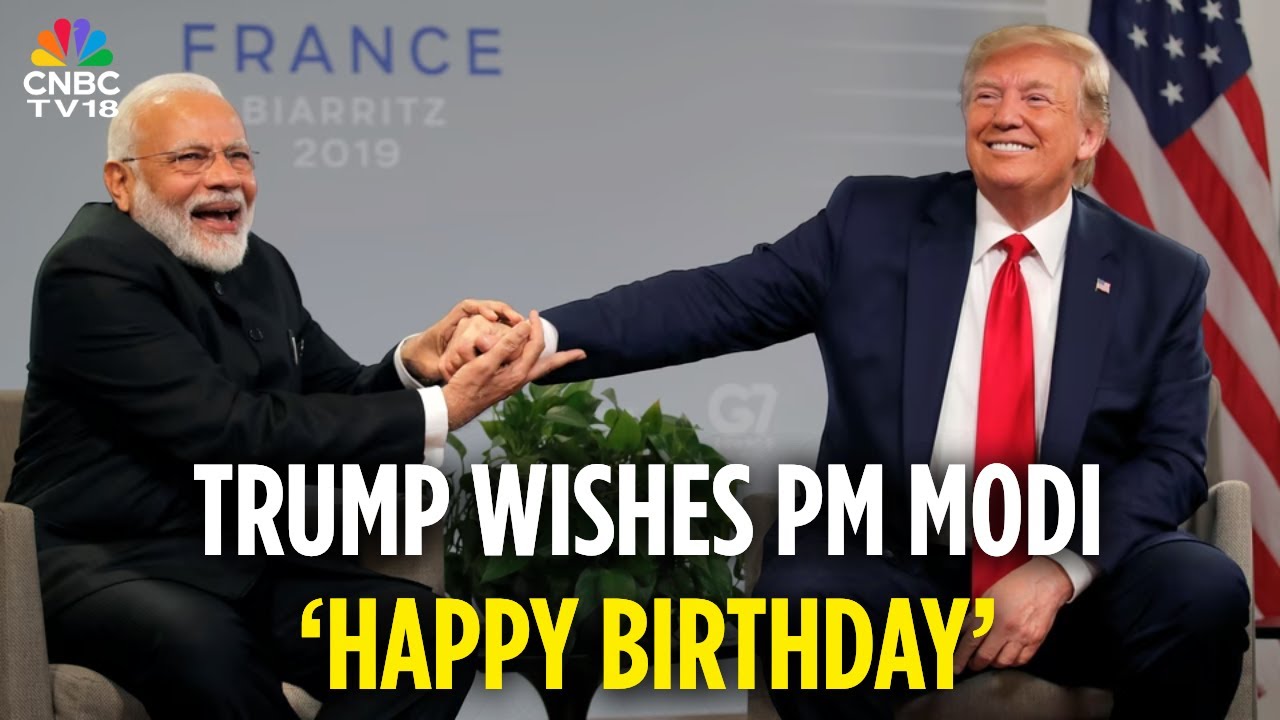 Indian Prime Minister Narendra Modi and former US President Donald Trump share a warm handshake at the 2019 G7 Summit in France, reflecting friendly IndiaUS relations