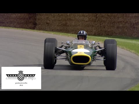 F1 Champion Damon Hill drives his father's Lotus at Goodwood