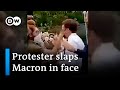 French President Emmanuel Macron slapped in face | DW News