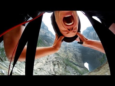 Jeb Corliss flies through Tianmen Cave in China