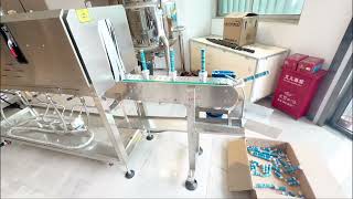 Automatic label sleeving machine with shrinking tunnel