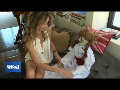 Annabelle Comes Home Doll on a local news cast at home with Natalia Safran