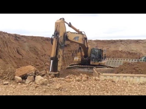 Caterpillar 365C L Excavator Loading Mercedes Actros 4144