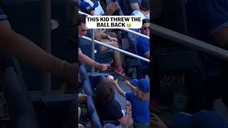 A young fan was gifted a foul ball but tried to send it back where it came from ????
