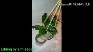 preview picture of video 'বারান্দার গ্রিল সাজাতে ঝুলন্ত ফুল গাছ পাট দিয়ে বানানো অসাধারণ ফুলের টব/Fancy flower tub made from h'