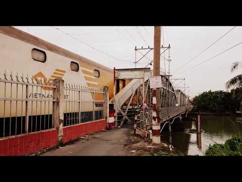 Train SE10 passing Rach Cat Bridge (2017)