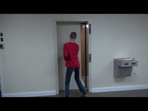 Otis Lexan Hydraulic Elevator at Professional Park with Door issue