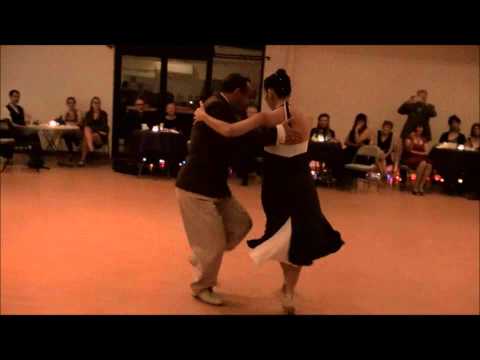  Jesica Arfenoni  and  Maximiliano Cristiani  are  dancing  to  the  tango  "  Calla bandonéon  "  by  Ricardo Tanturi
