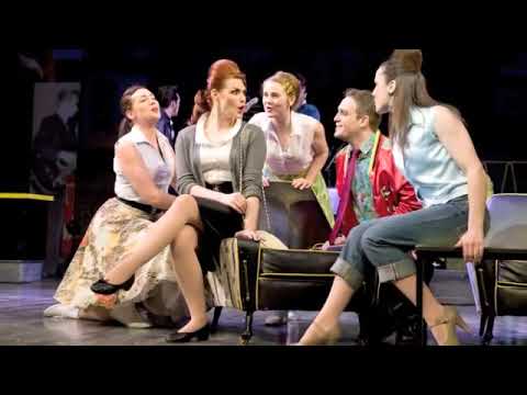 Trailer frame: confetti-laced encore with the company leading a twist finale