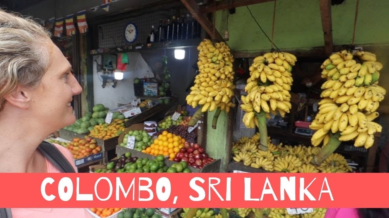 A traveler participates in Sri Lankan Cooking class with market tour.