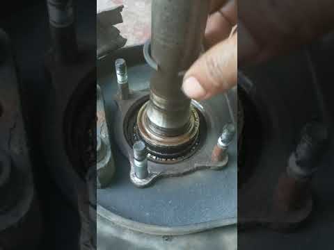 How to remove rear axel bearing on a 2005 Nissan Frontier se VQ 40 left hand drive.  PART 1
