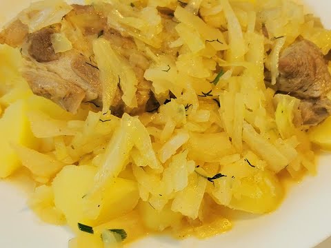 Weißkohl mit Fleisch und Kartoffeln, leckeres Mittagessen, Weißkohl Eintopf