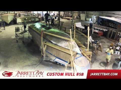 Glassing Hull 58 - Custom Center Console by Jarrett Bay Boatworks