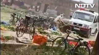 On Camera, UP Cop Crushes Vegetables With Police Car, Reverses Over Them - Download this Video in MP3, M4A, WEBM, MP4, 3GP