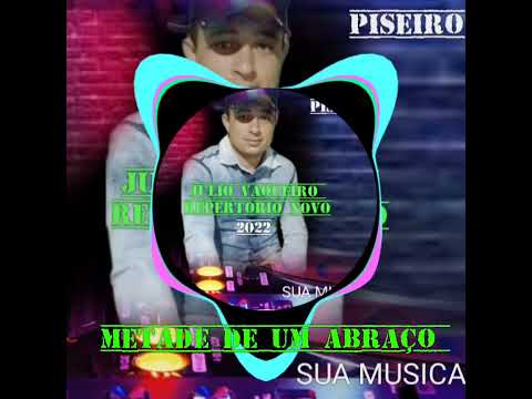 JULIO VAQUEIRO-METADE DE UM ABRAÇO