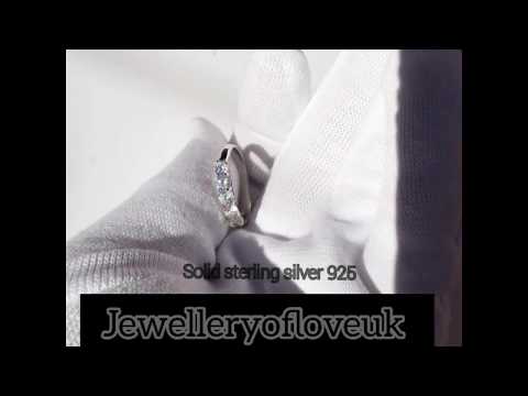 Sterling Silver 5 stone eternity ring.