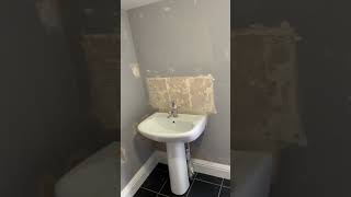 Preview of Before and after of this bathroom install using the Linear Matt white tile from Topps Tiles..