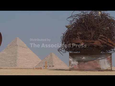 Contemporary artwork meets ancient wonder at art show by the Giza Pyramids
