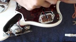 Video thumbnail for Squier Vintage Modified Jaguar - Upgrades and mods Part 2 by The Guitar Modder