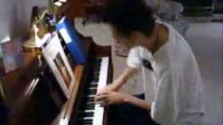 Andrew Furmanczyk head banging like a moron playing piano