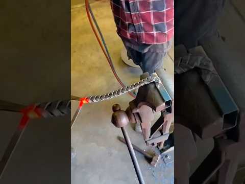 Intense Heat Shaping Blacksmith Twists Metal Bar into a Beautiful Braided Design