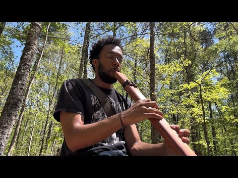 playing my drone flute in the woods